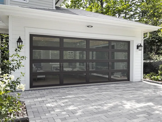 Monroe Garage Door Repair design specialist presenting custom garage door options to Monroe homeowner