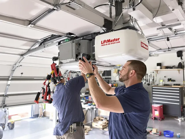 Monroe Garage Door Repair technician performing advanced diagnostics on garage opener in Monroe